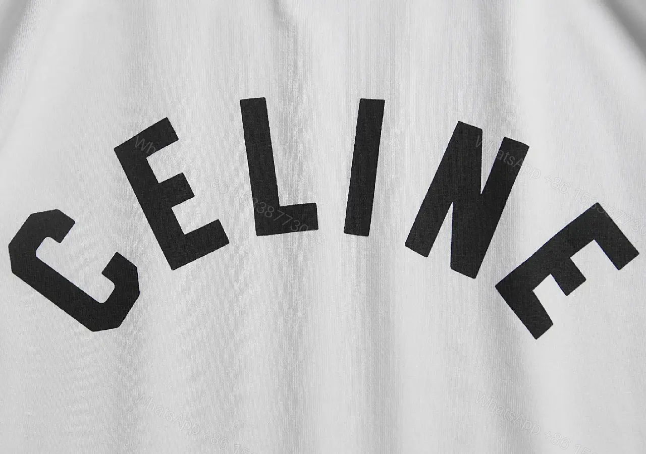 View 7 of White Cotton Graphic Tee: Bold CELINE-Inspired Minimalist Shirt