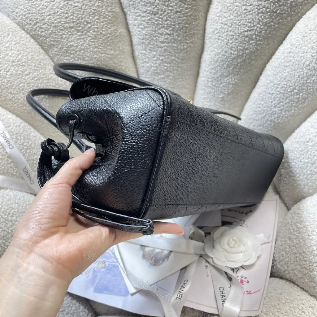 View 4 of Quilted Black Leather Handbag with Gold Hardware