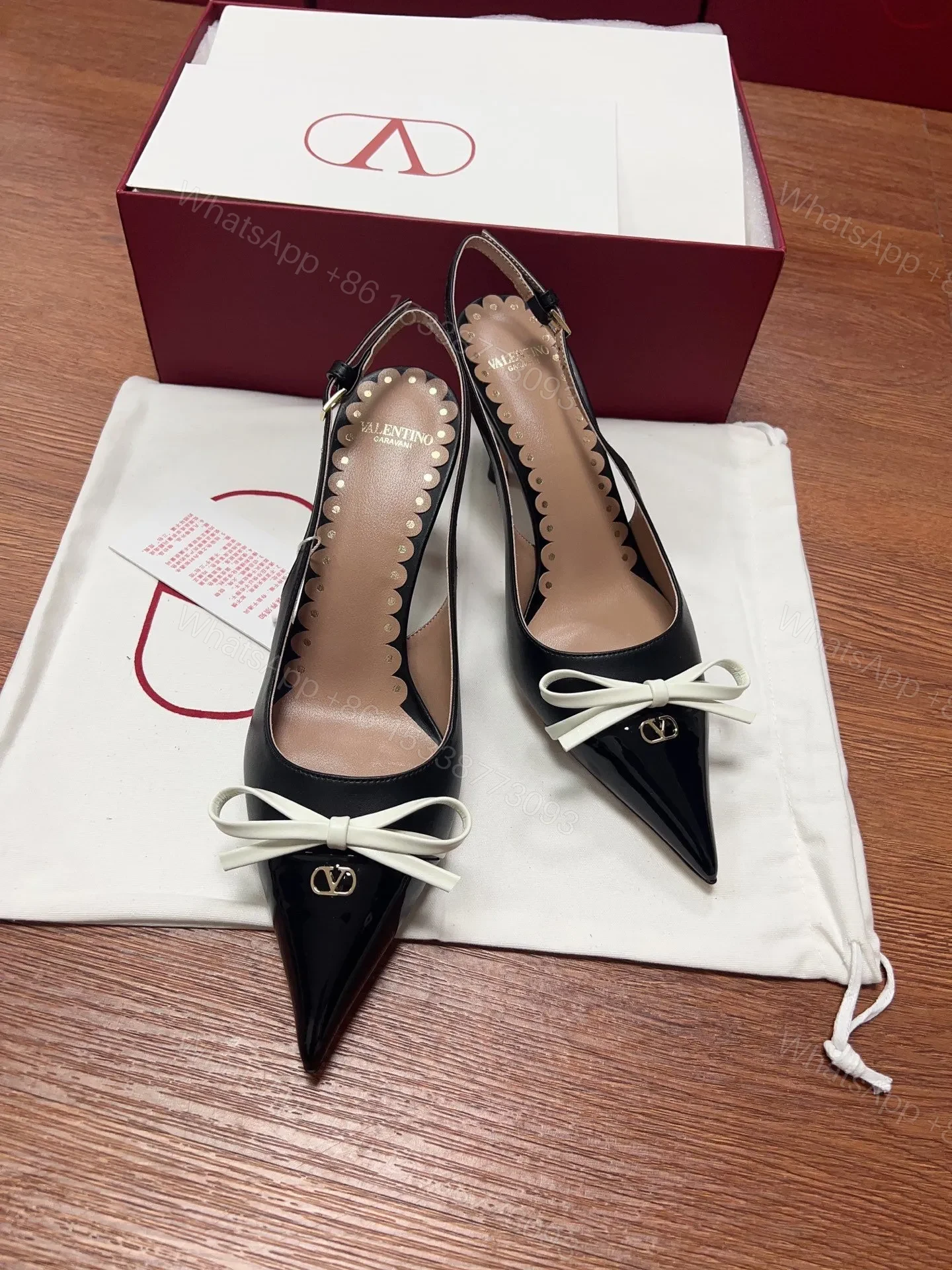 View 2 of Valentino Women Black Patent Leather Bow Slingback Pumps