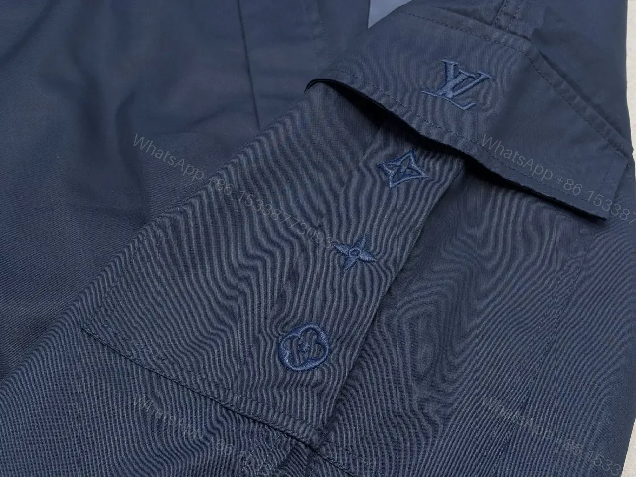 View 4 of Navy Cargo Shorts with Louis Vuitton Logo Embossed Key Features Short