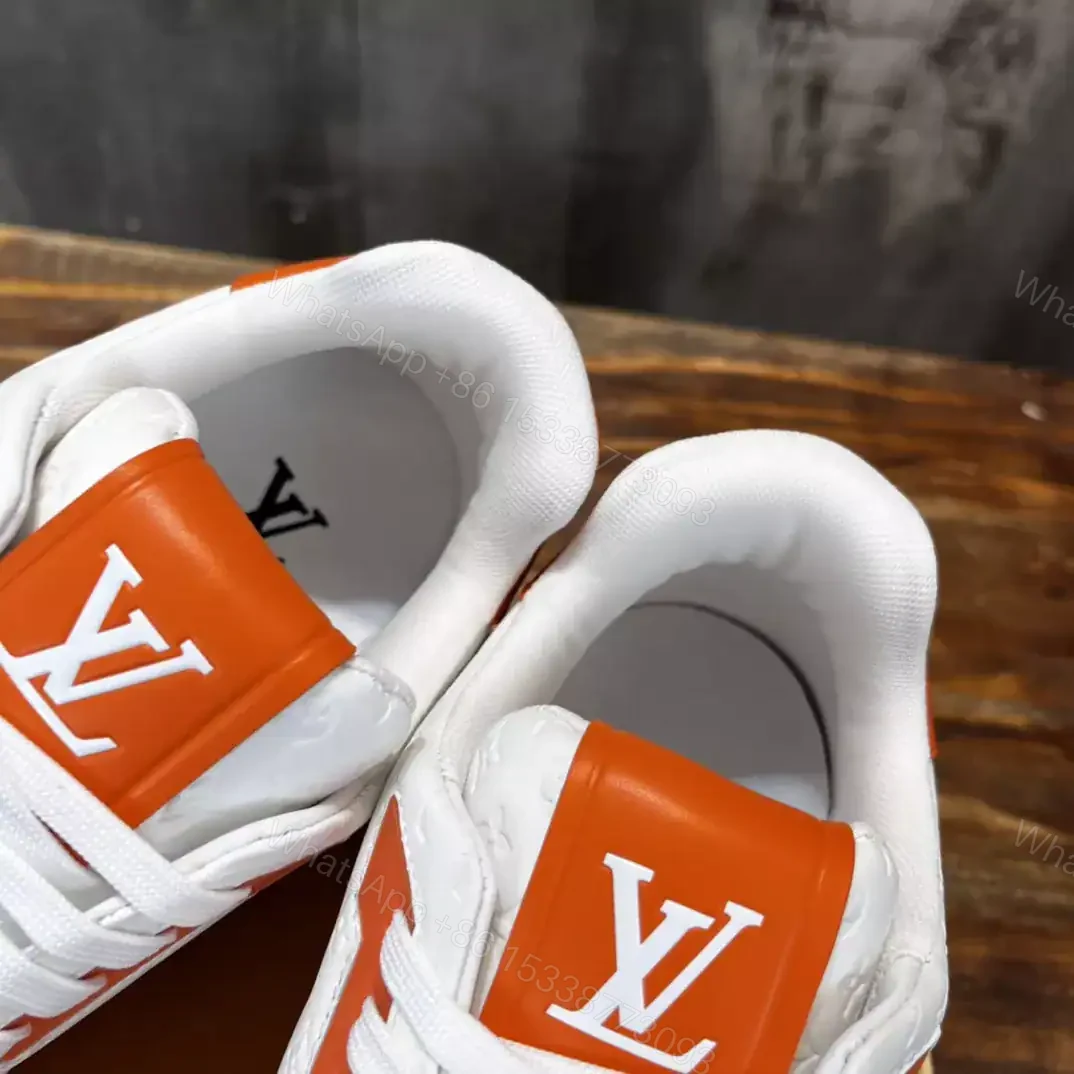 View 5 of LOUIS VUITTON TRAINE SNEAKERS IN WHITE AND ORANGE – LSVT386