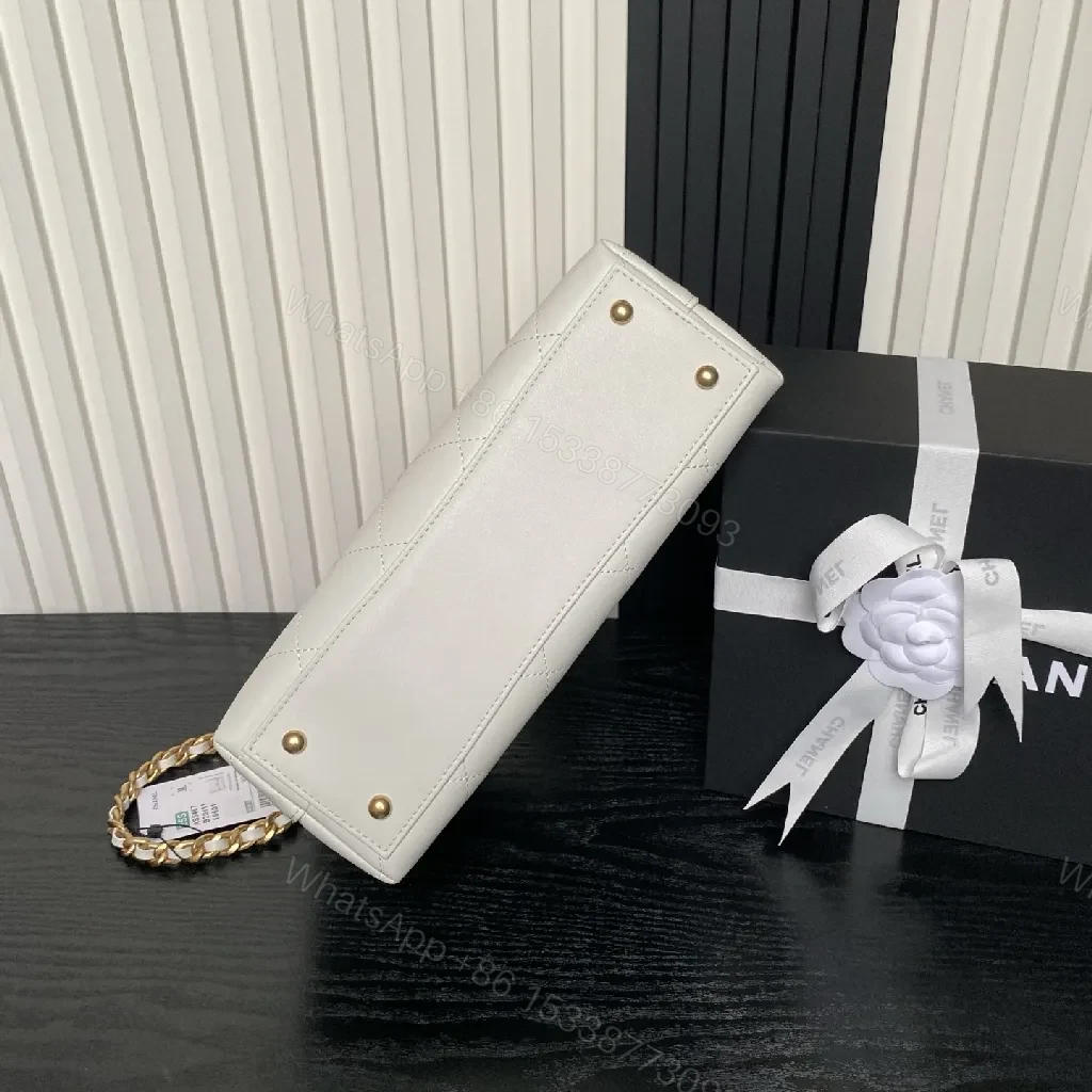 View 9 of White Quilted Mini Leather Bag with Gold Chain – Luxe Compact Style