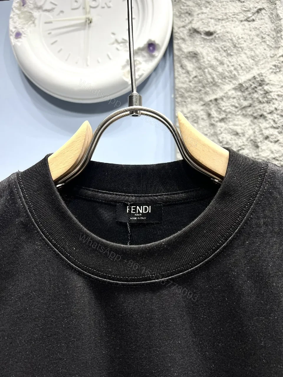 View 9 of Bold Black Tee with Red Fendi Logo Film-Glow