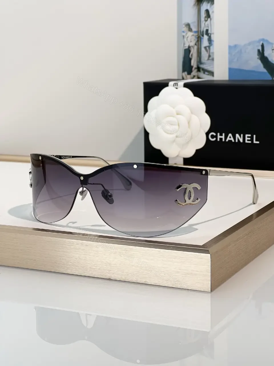 View 2 of Lux Black Gold Shield Sunglasses with Chanel Logo