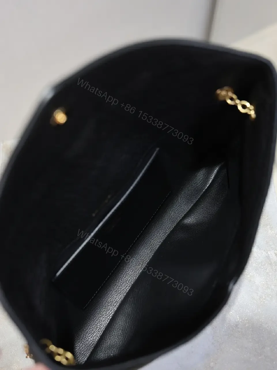 View 5 of Pebbled Leather Envelope Flap Bag, Gold Logo, Day-to-Night Versatility
