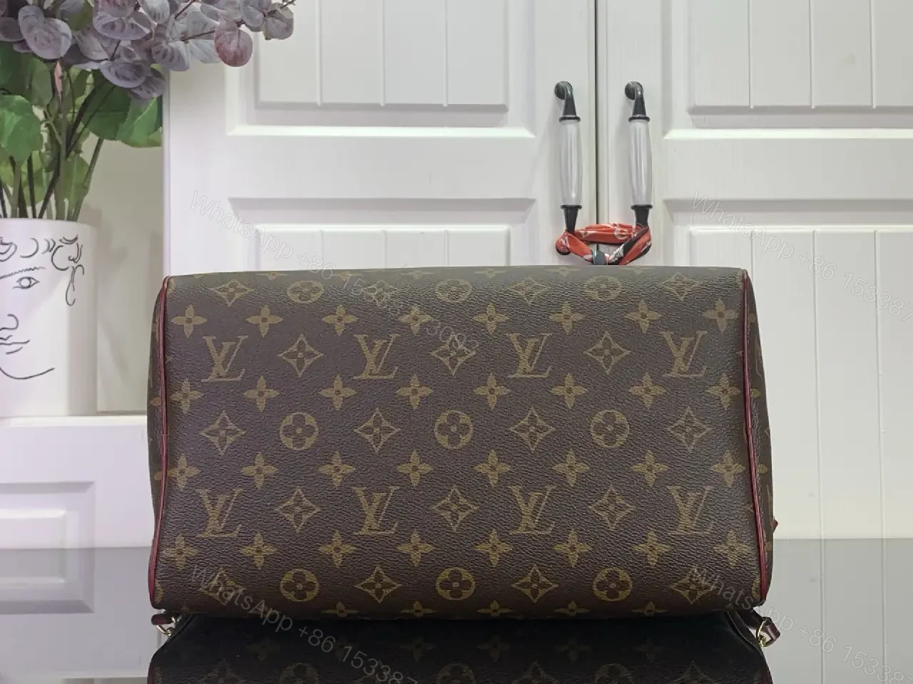 View 13 of Brown Canvas LV Monogram Travel Handbag with Burgundy Leather Trim