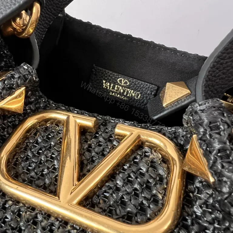 View 8 of Black Woven Luxe Handbag: Compact, Gold-Accent Style Bag