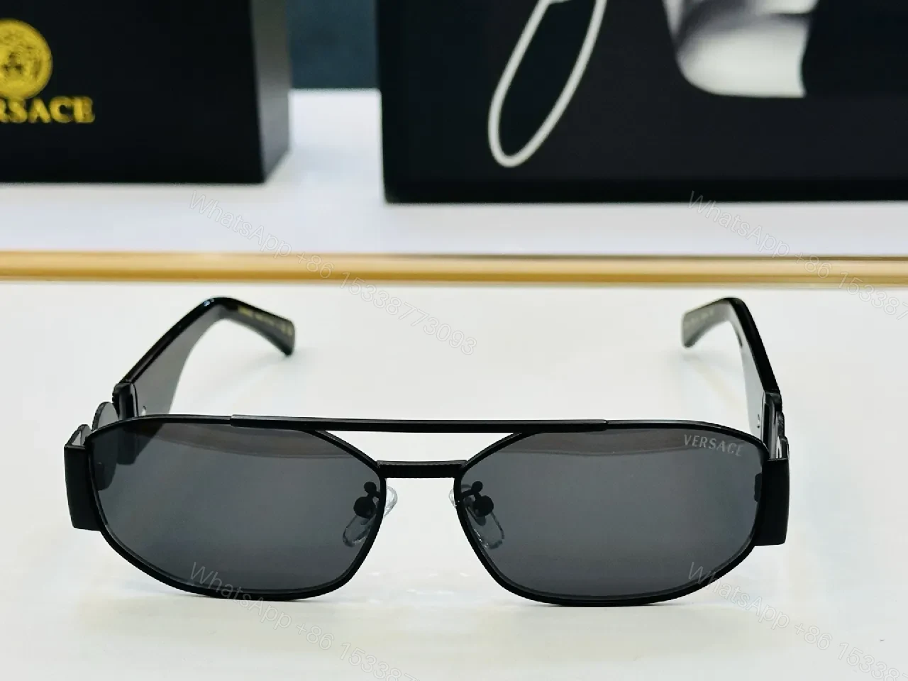 View 2 of Minimalist Metal Sunglasses: Sculpted Temple Detail, Polarized UV Protection