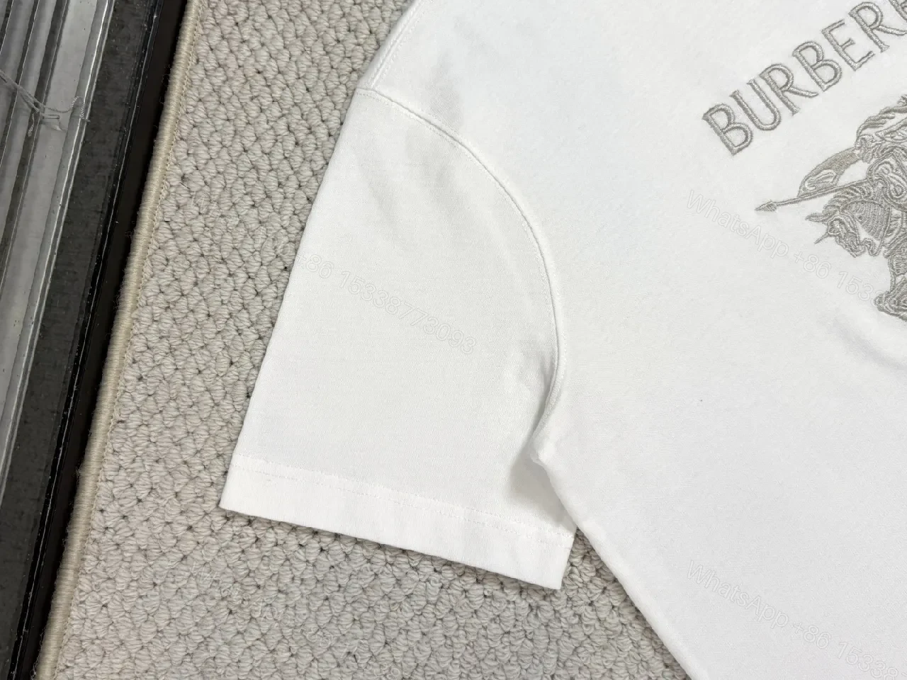 View 8 of White Cotton Tee with Metallic Crest Detailing, Premium Casual Style