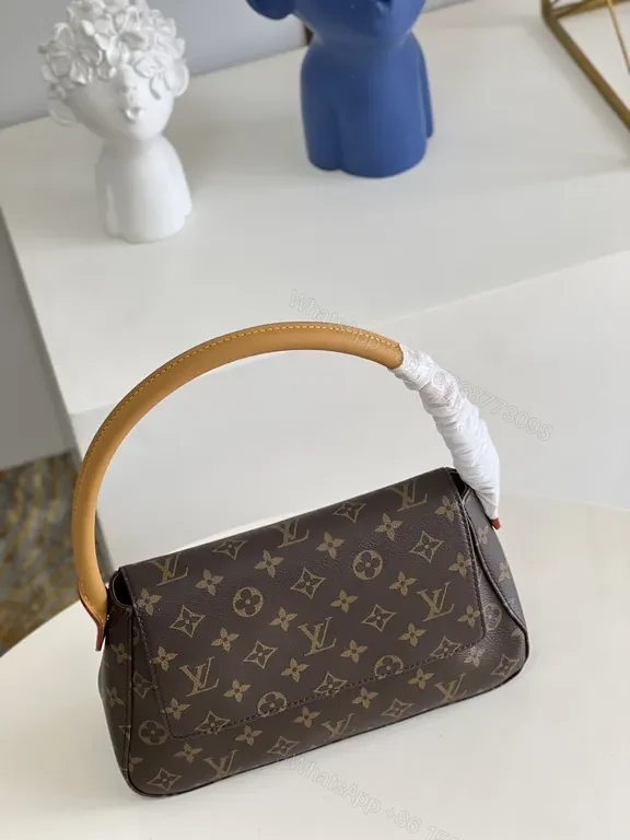 View 2 of Louis Vuitton Monogram Top-Handle Bag: Compact Luxury for Day to Night