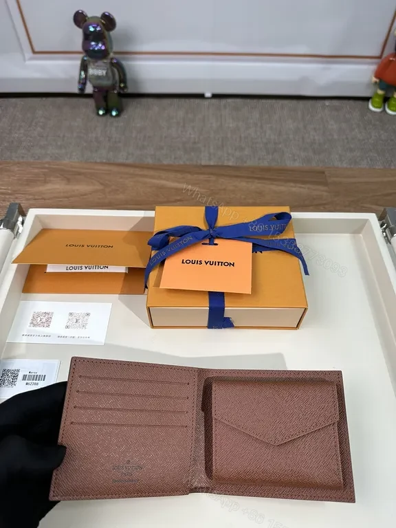 View 3 of Monogram Leather Wallet: Classic Louis Vuitton Bi-Fold, Slim Profile