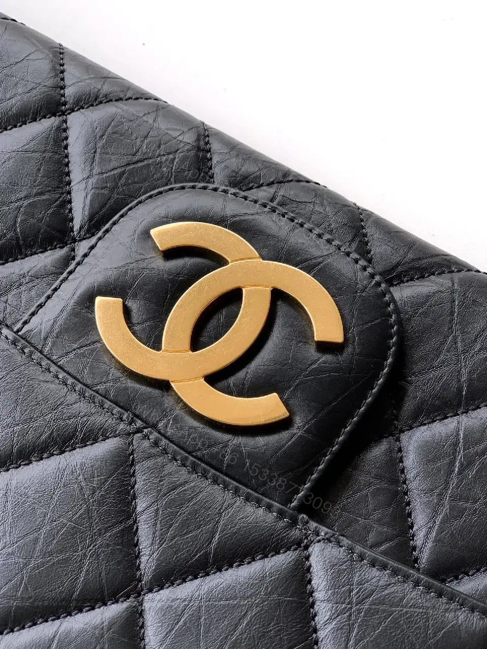 View 5 of Compact Quilted Leather Wallet with Gold Logo