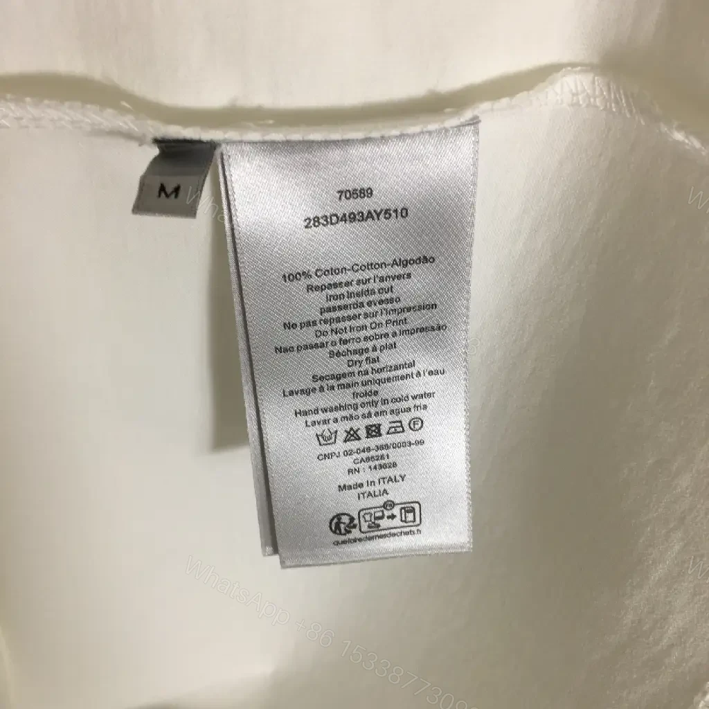 View 9 of White Cotton Tee with Embroidered Pony – Subtle Luxury Style