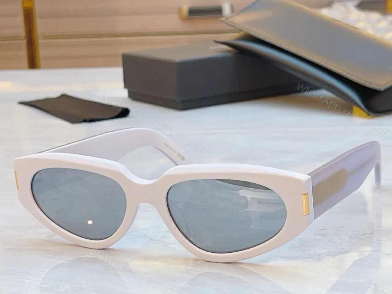 View 7 of Tortoiseshell Cat-Eye Sunglasses with Gold Hardware, UV400 Lens