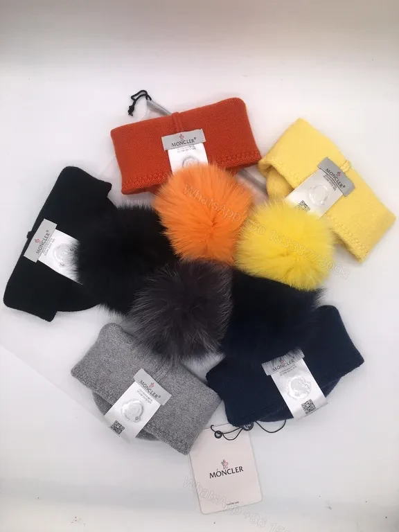 View 2 of Sunny Yellow Moncler Pom Beanie â€“ Luxurious Warmth, Bold Color Pop