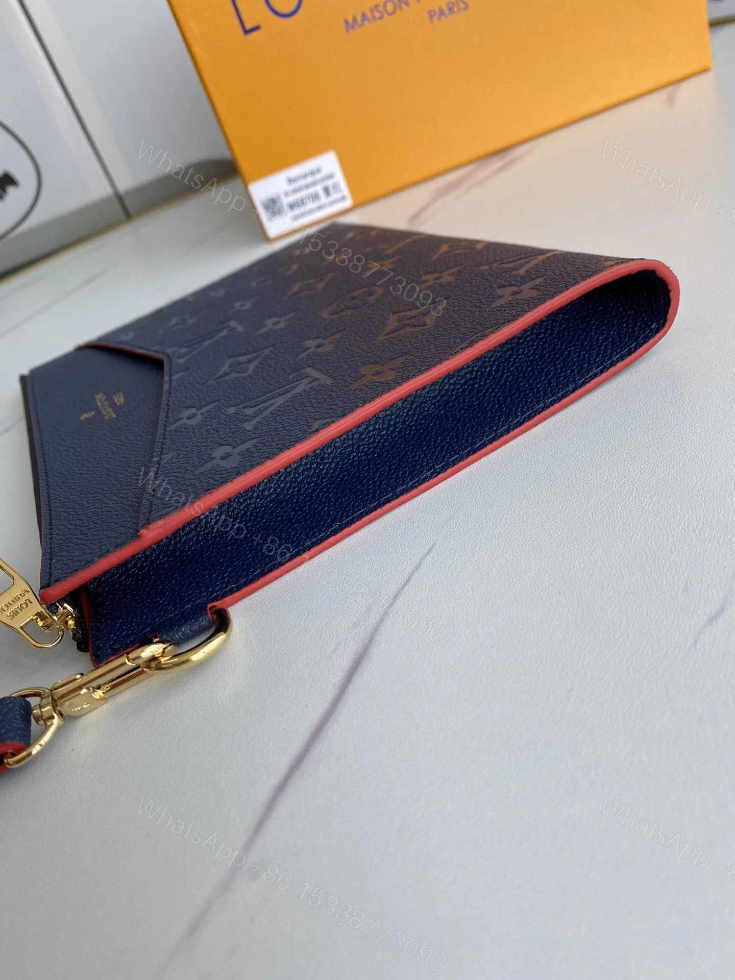 View 4 of Louis Vuitton Marine Rogue Monogram Empreinte Daily Pouch