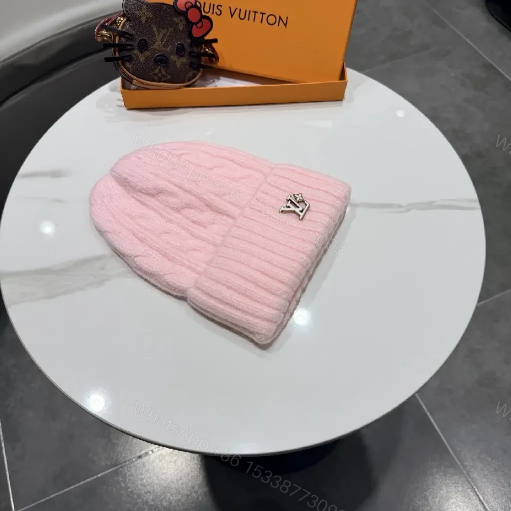 View 5 of Pastel Knit Beanie with Silver Emblem – Luxe Everyday Accessory
