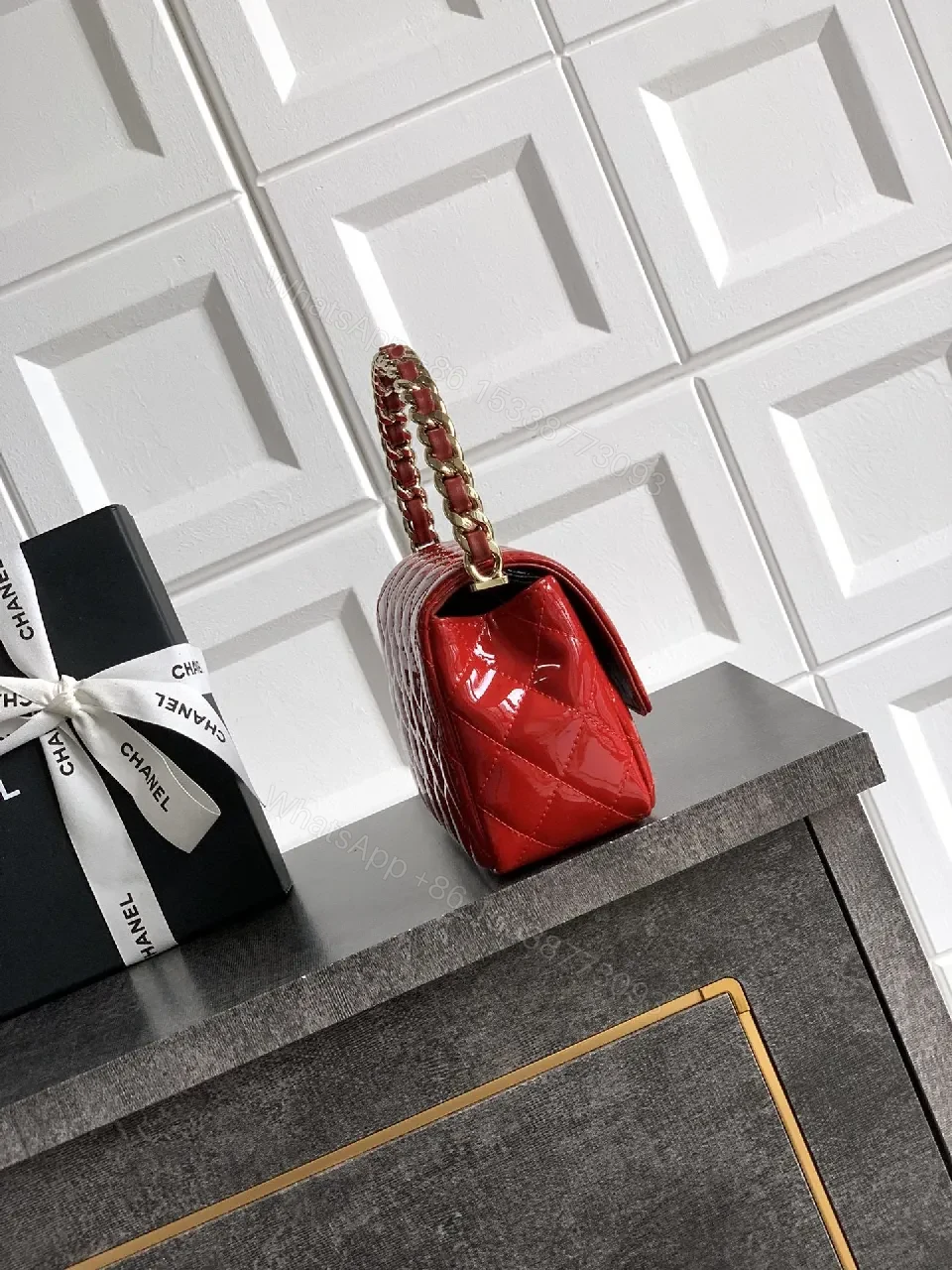 View 2 of Statement Red Quilted Calf Leather Compact Handbag