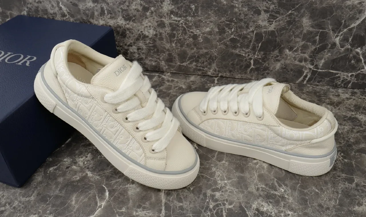 View 9 of White Leather Minimalist Low-Top Sneakers with Luxe Trim