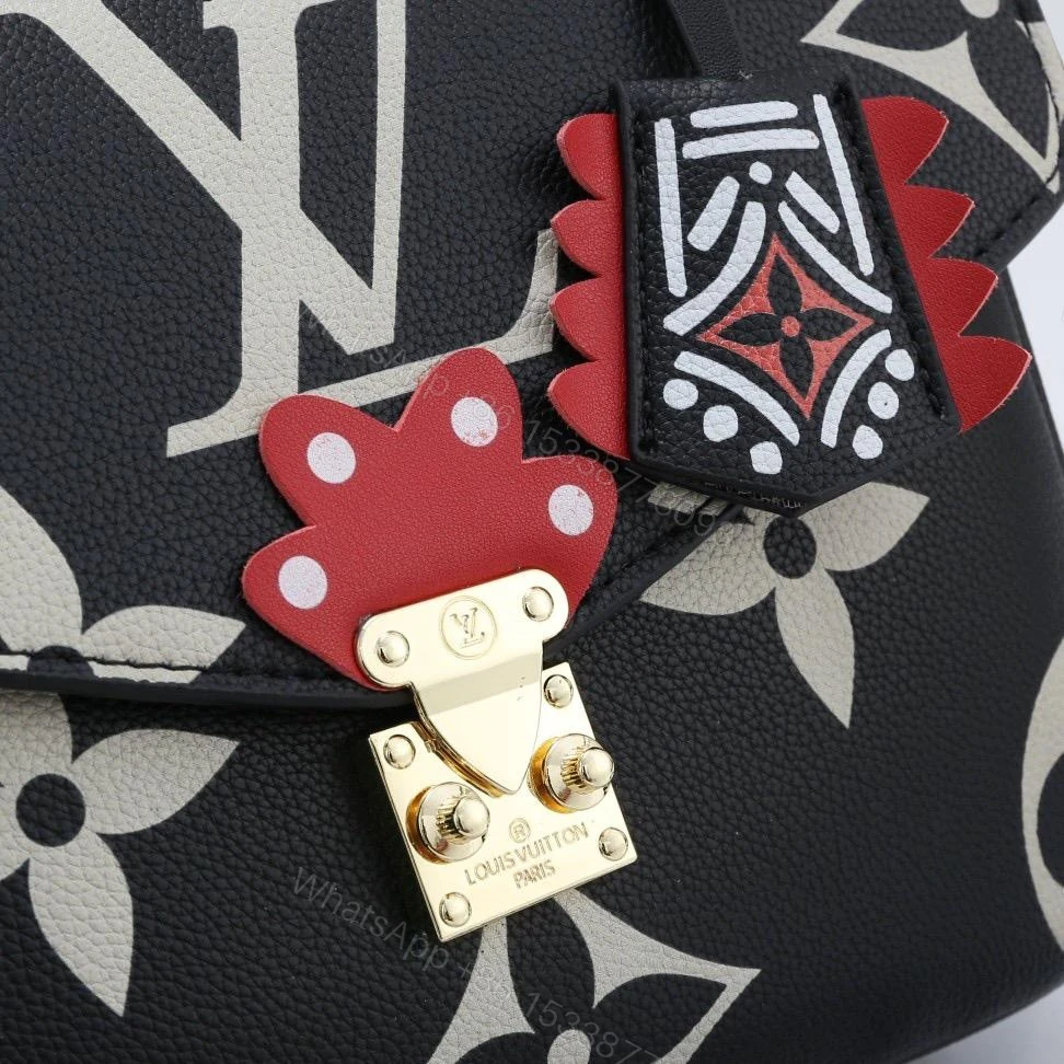View 4 of Louis Vuitton Crafty Pochette Metis Black