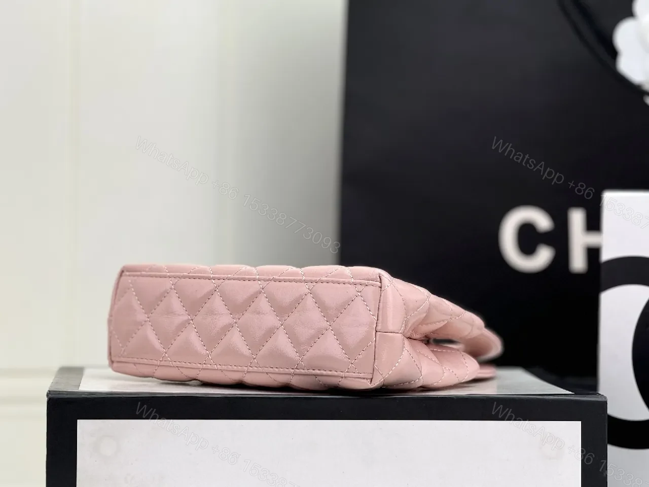 View 9 of Soft Pink Quilted Mini Bag with Gold Hardware, Elegant Twist, Mini Bag