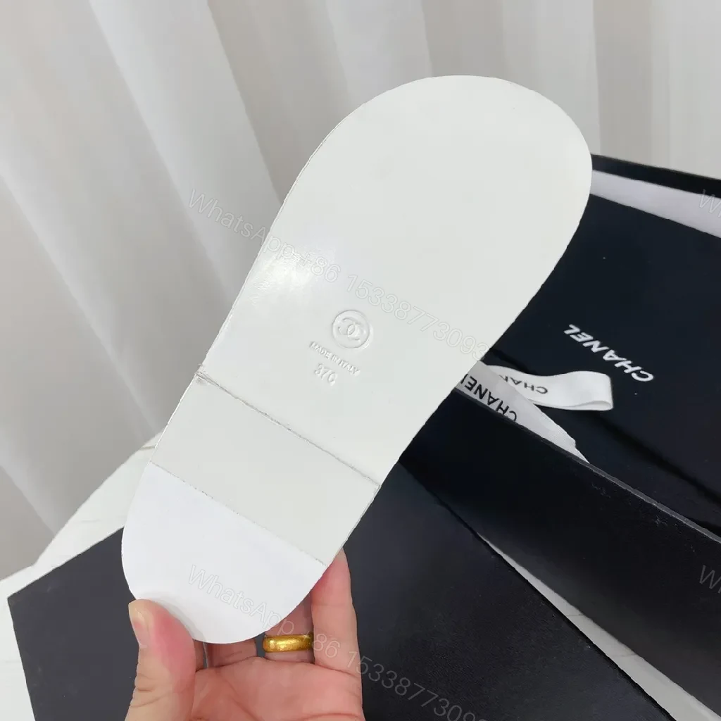 View 7 of White Quilted Leather Sandals with Gold Logo Hardware