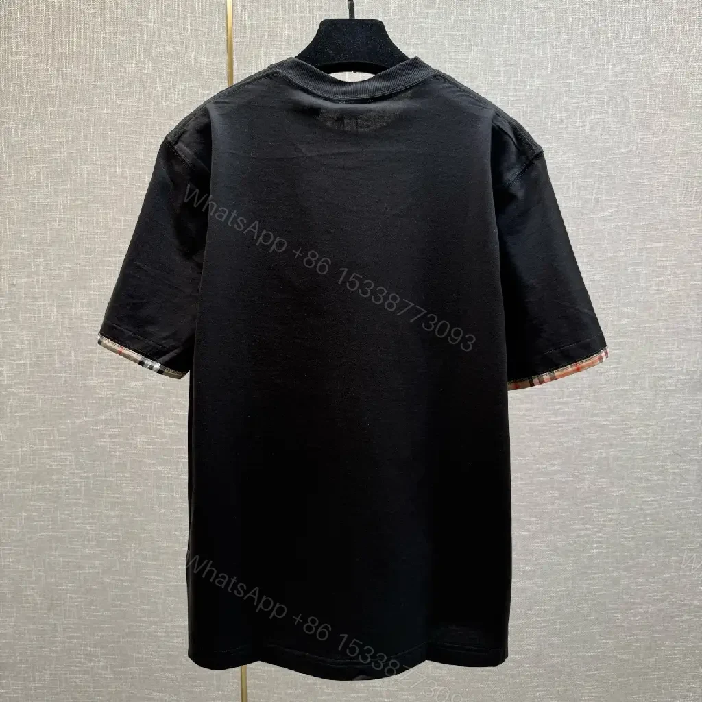 View 7 of Minimalist Black Cotton Tee with Plaid Sleeve Trim
