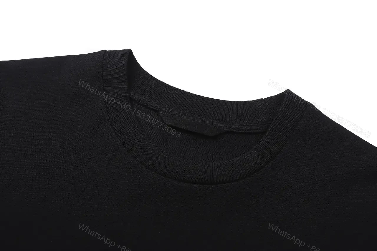 View 8 of Minimalist Cotton Crest Tee - Black Luxe Tee