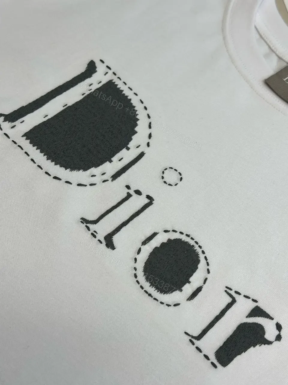 View 7 of Minimalist White Logo Tee - Premium Cotton, Modern Fit, Graphic Accent
