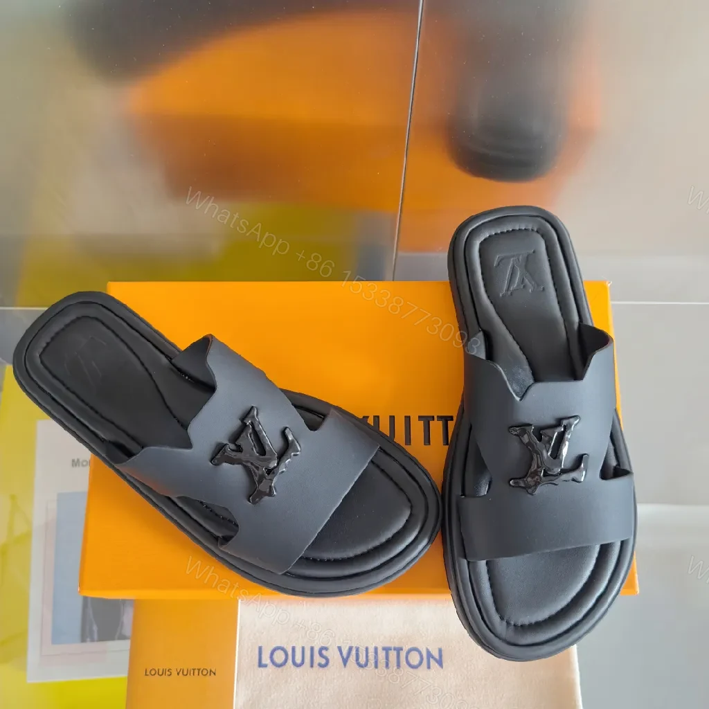 View 9 of Minimalist Black Leather Slides with Signature Emblem