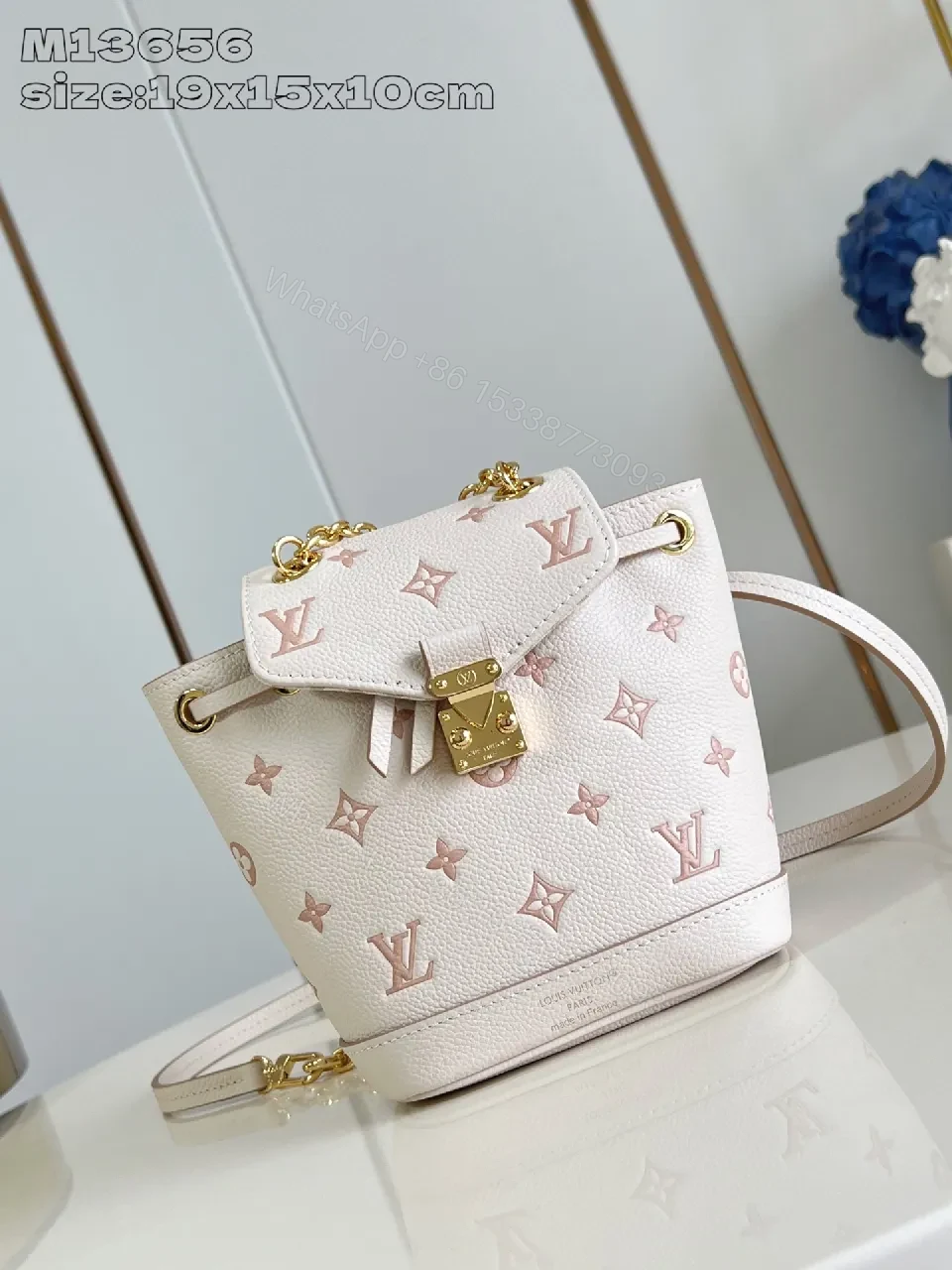 Soft Pink Monogram Bucket Bag - Textured Leather, Gold Hardware, Elegant — view 1