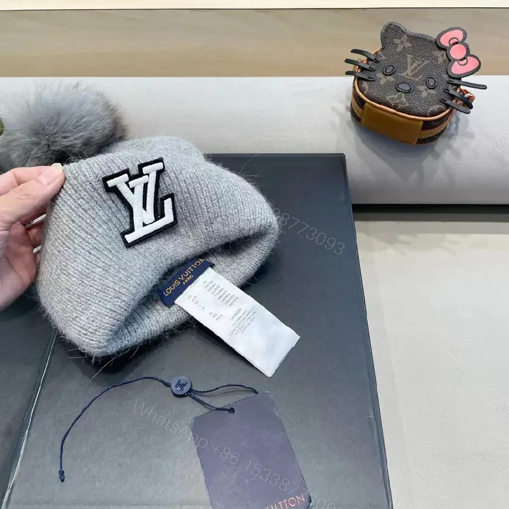View 7 of Cozy Gray Knit Beanie with LV Emblem Accent