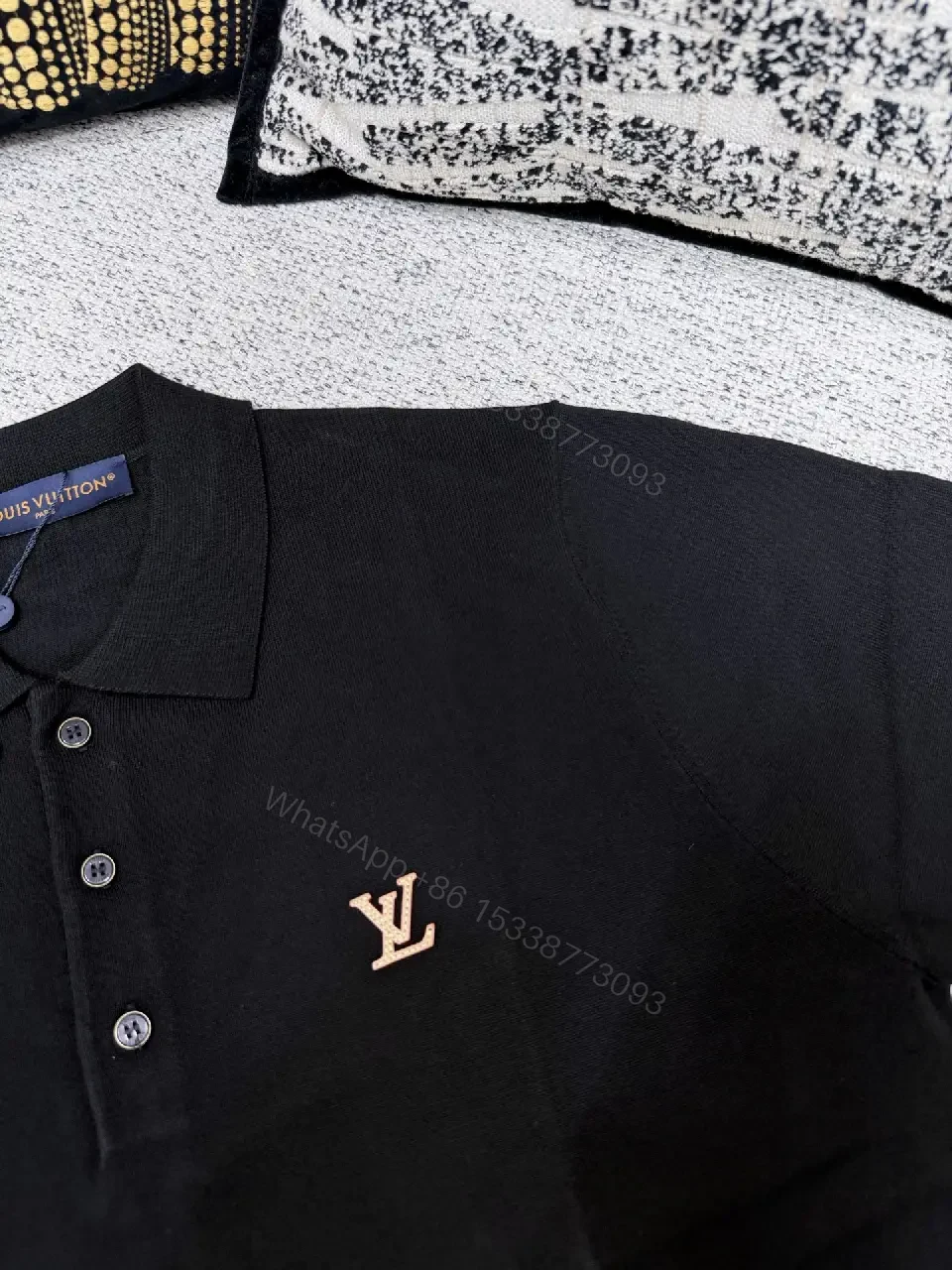 View 11 of Black Polo with Subtle Gold Logo - Refined Everyday Versatility