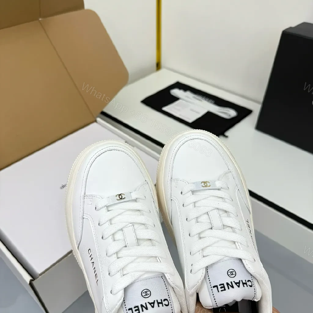 View 3 of White Leather Platform Sneaker with Subtle Chanel-Inspired Detail