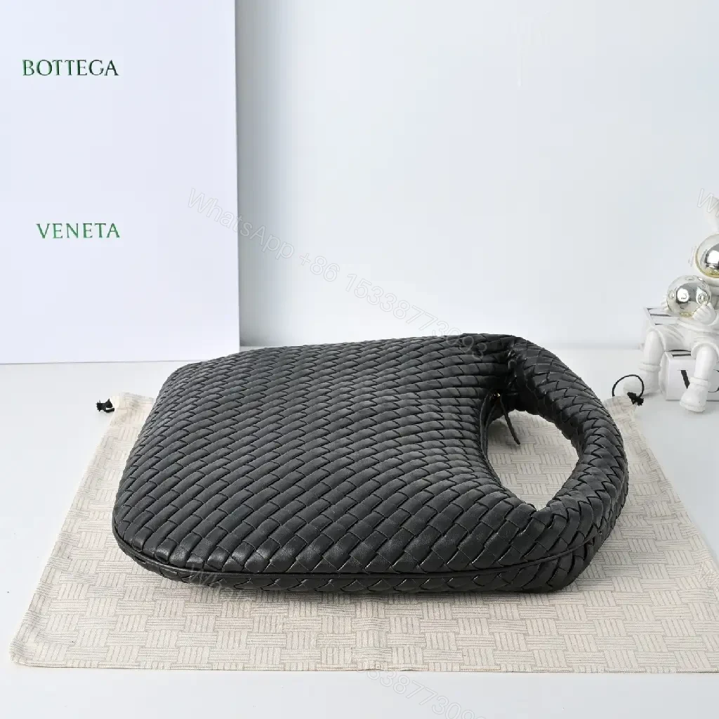 View 6 of Basketweave Handbag in Black – Premium Vegan Leather, Curved Handle, Compact Luxury Bag