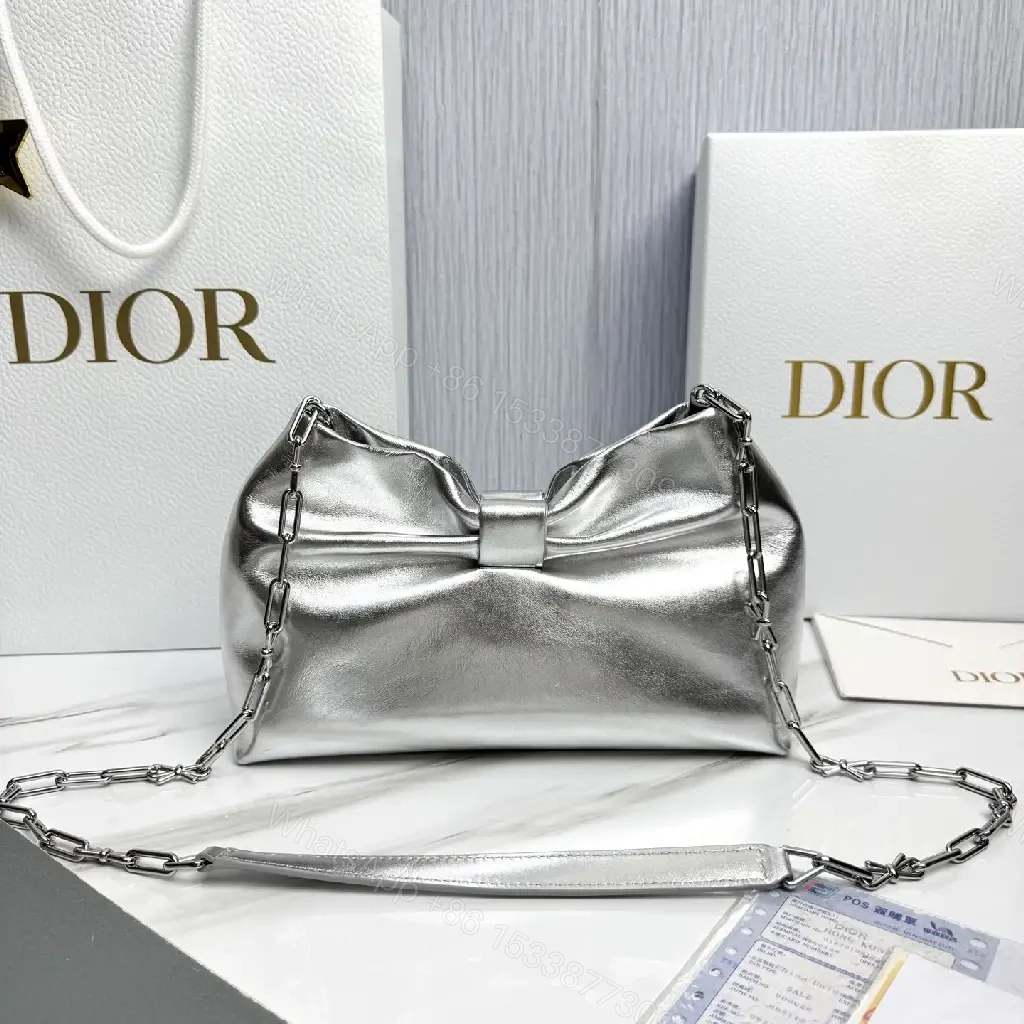 View 3 of Shimmer Metallic Bow Crossbody: Luxe Compact Crossbody Bag