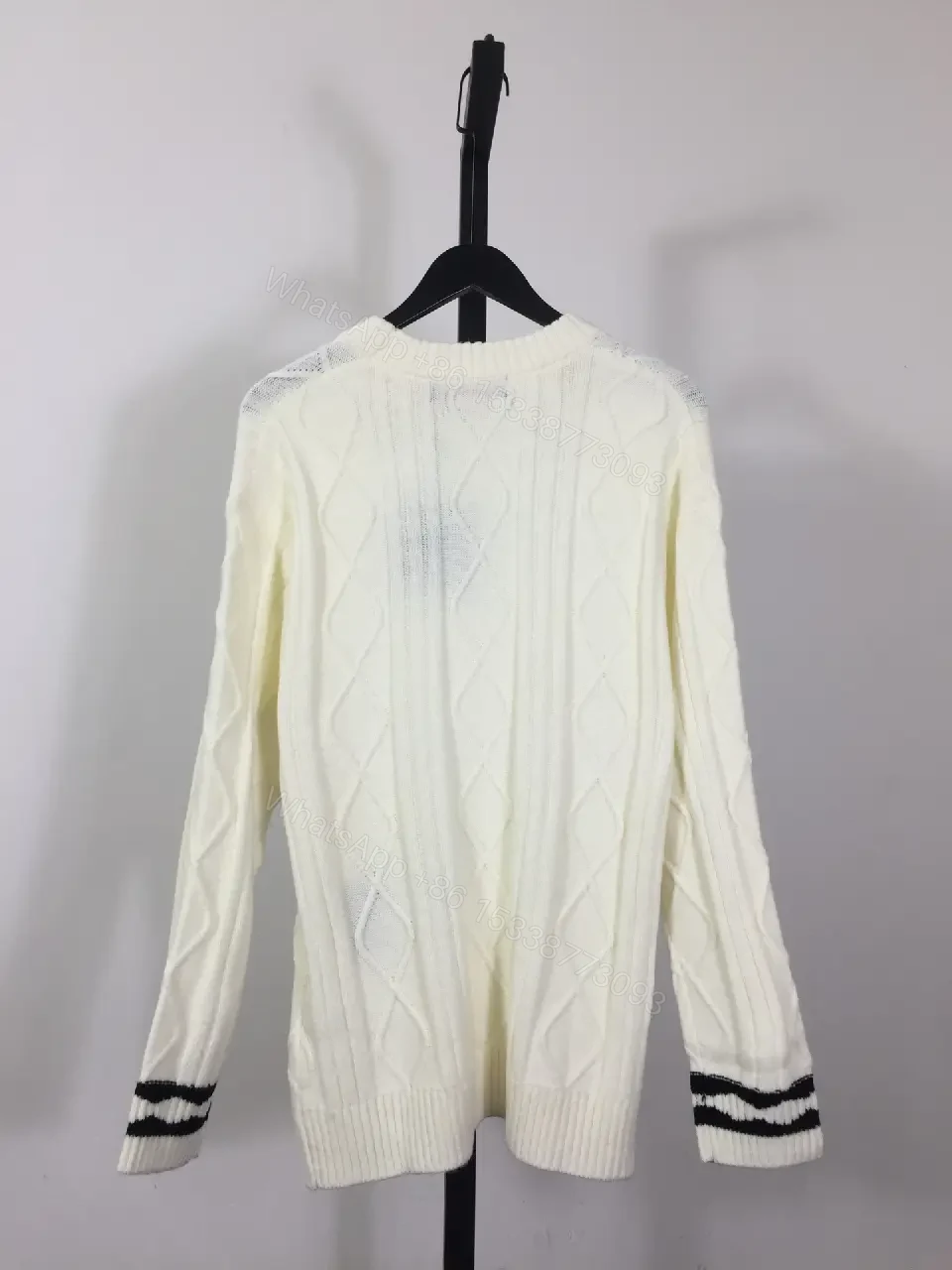 View 3 of Creamy Off-White Cable-Knit Crewneck Sweater with Striped Cuffs