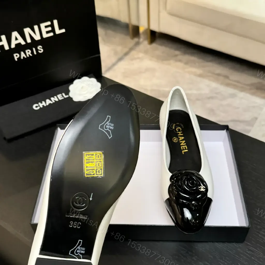 View 9 of Chic White & Black Ballet Flats with Rose Embellishment