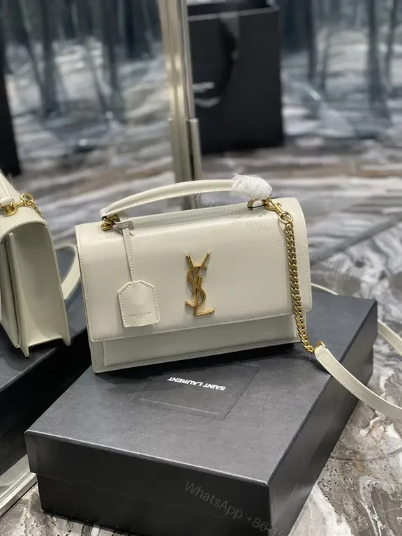 View 2 of Structured Leather Crossbody: White & Gold, YSL Emblem, Compact Luxury Bag