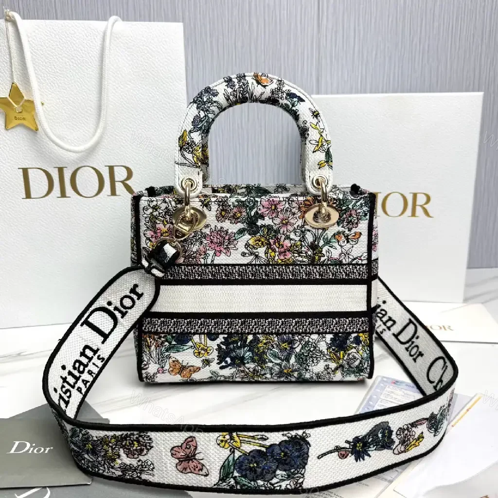 View 3 of Floral Canvas Luxe Bag with Logo Detailing Handbag