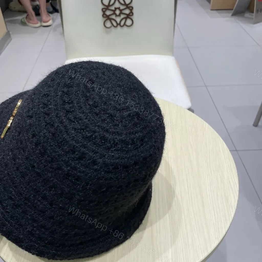 View 2 of Black Knit Bucket Hat with Gold Emblem, Premium Texture, Everyday Luxury