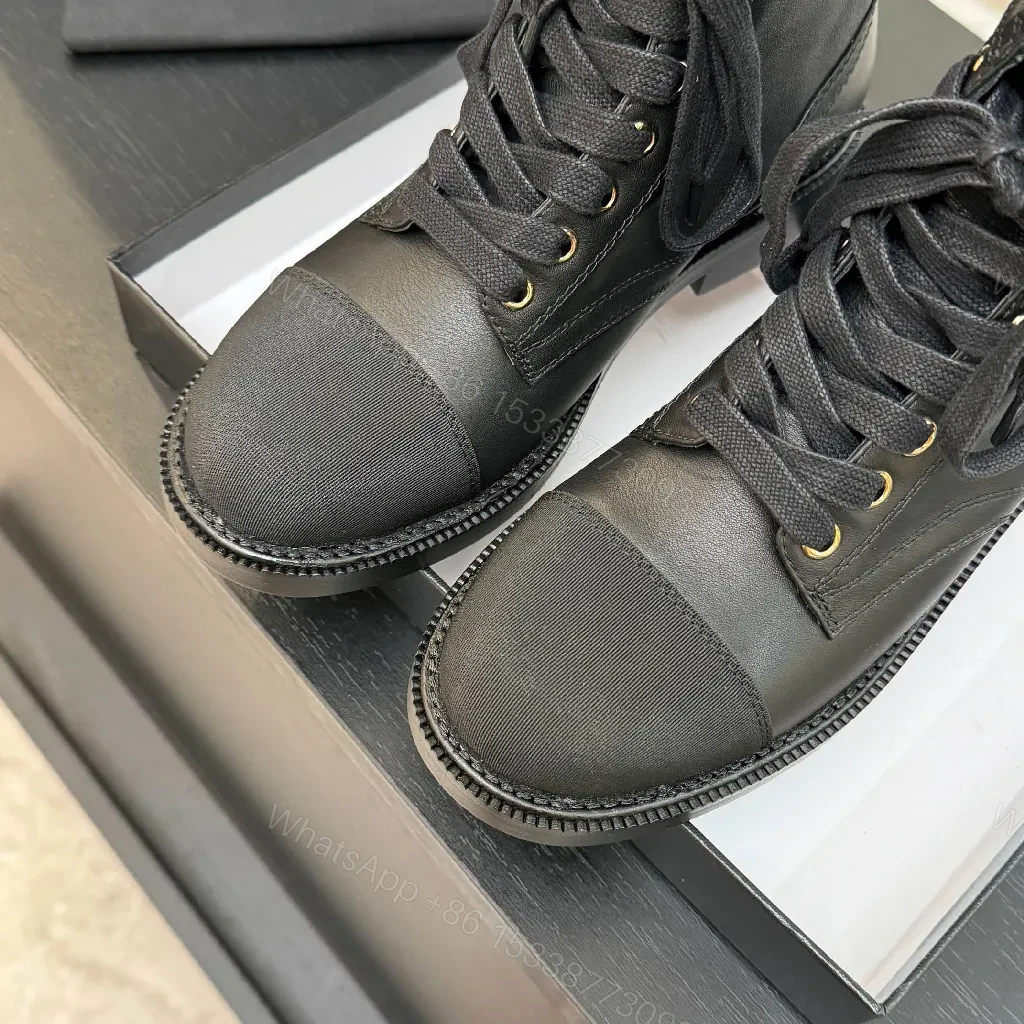 View 7 of Chic Black Combat Boots with Gold Detailing - High-Top Style