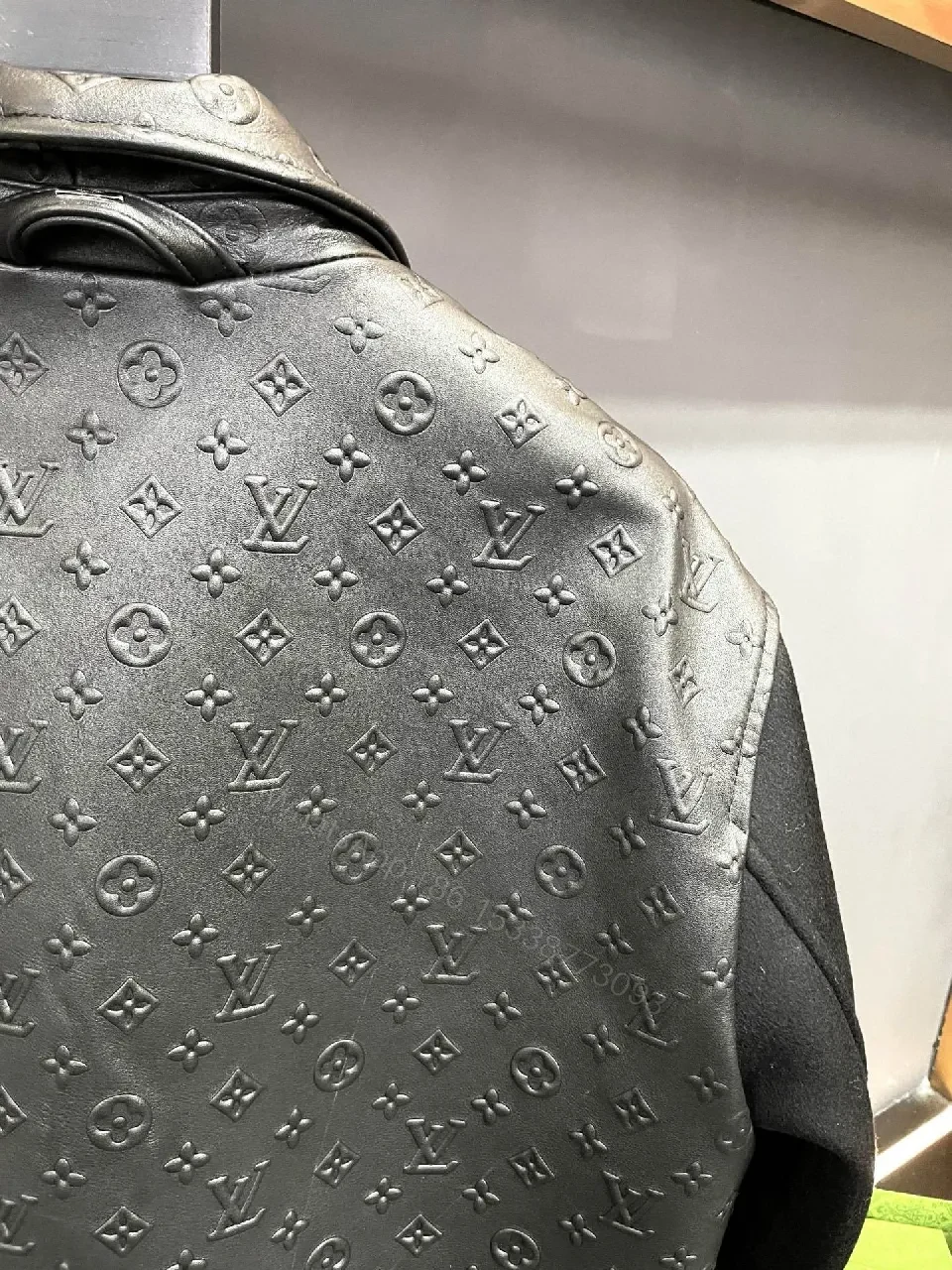 View 7 of Monochrome Leather-Embossed Varsity Jacket: Luxe Texture