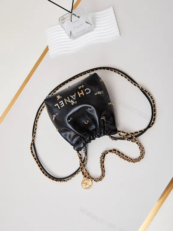 View 4 of Chanel-Inspired Mini Leather Drawstring Bag with Chain Detail