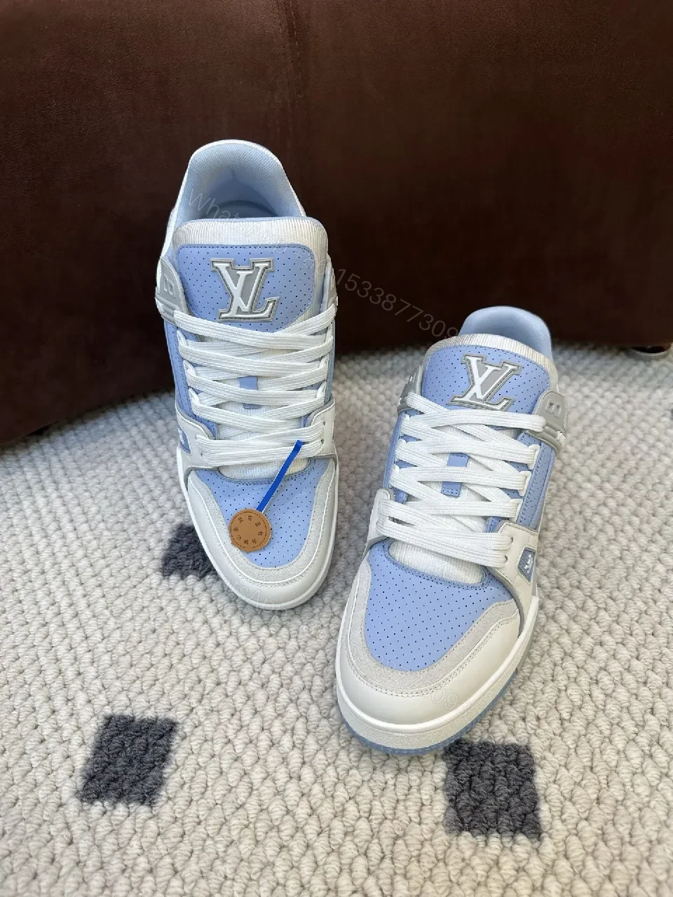 View 9 of Light-Blue Perforated Panels Modern Low-Top Sneakers with LV-Inspired Accents