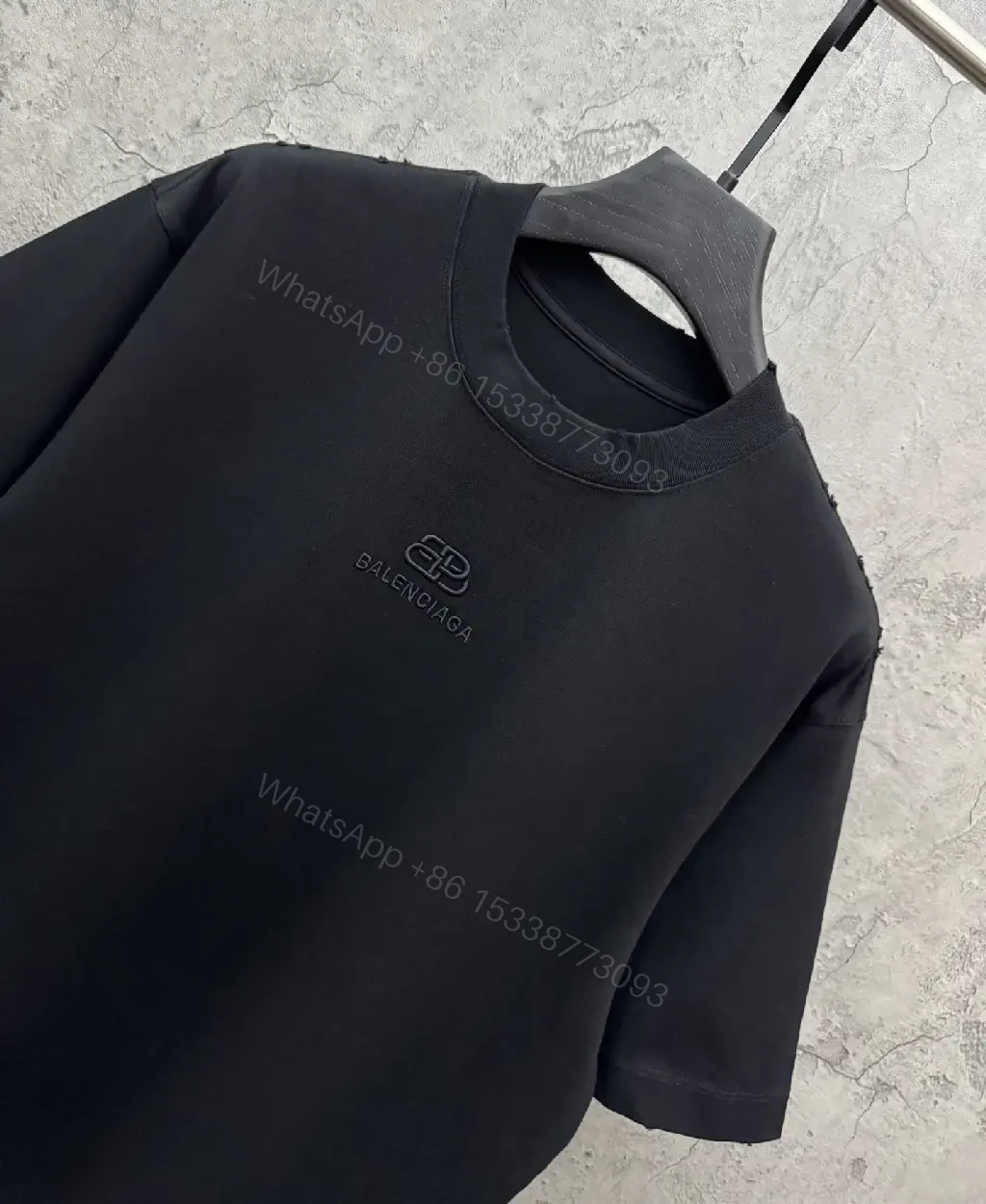 View 9 of Textured Logo Black Knit Tee – Oversized Luxury Streetwear