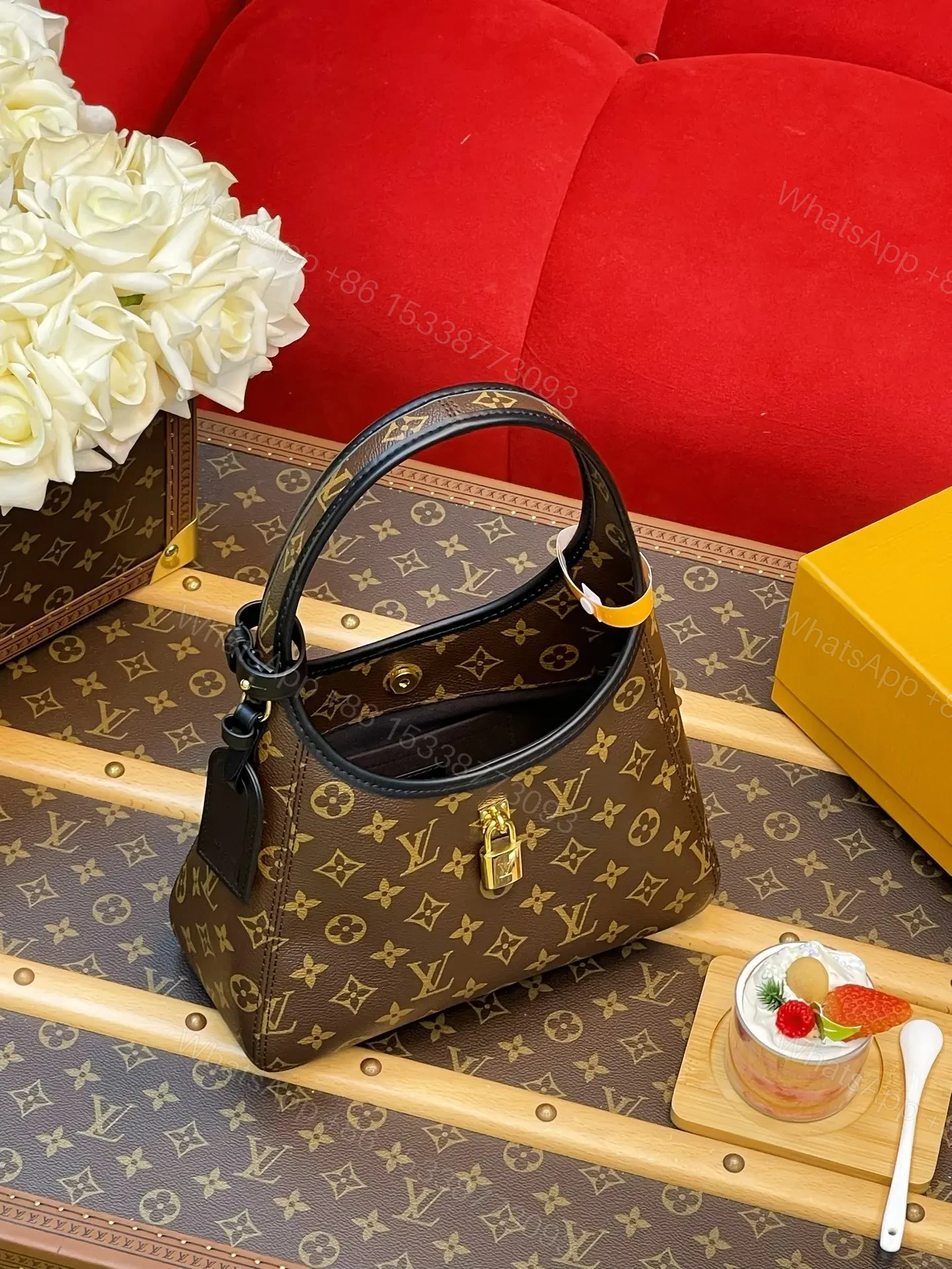 View 3 of Louis Vuitton The Drop PM Handbag in Monogram Coated Canvas