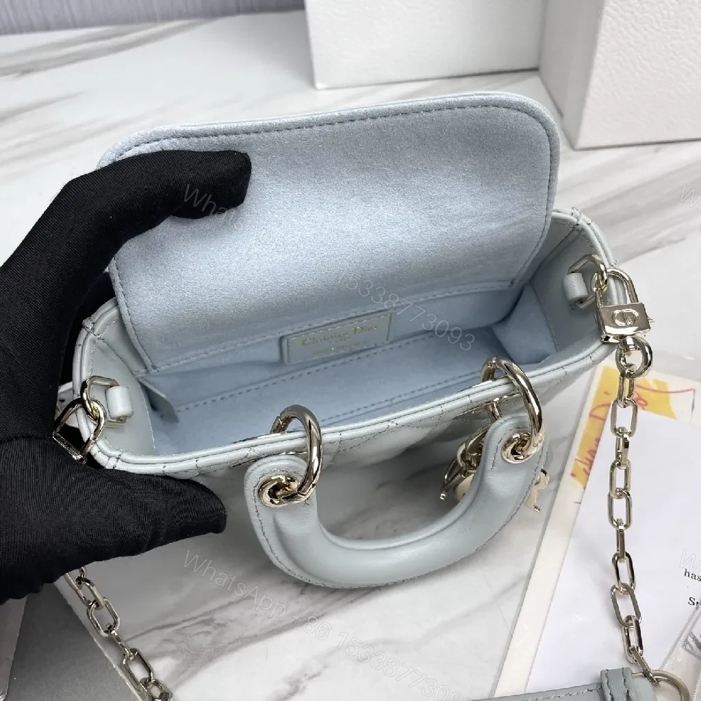 View 6 of Soft-Texture Quilted Mini Bag with Gold Charms, Calfskin, Elegant Chic, Luxury Carryall