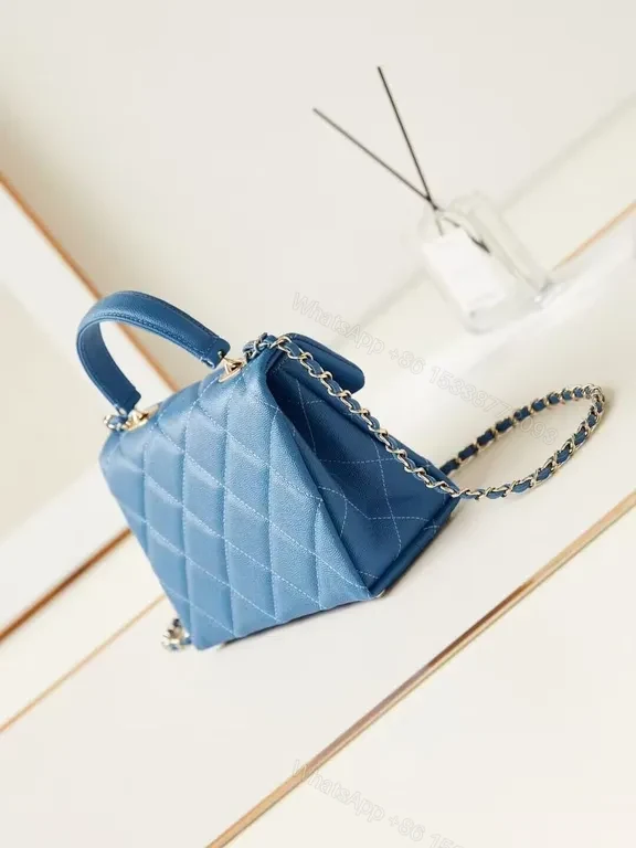 View 2 of Chic Ocean-Blue Quilted Mini Bag with Chain Detail