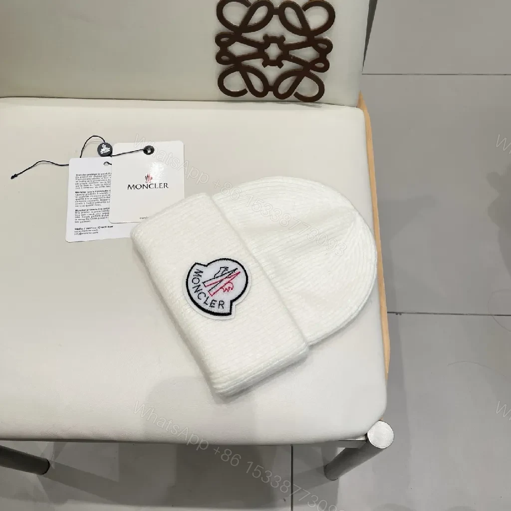 View 8 of White Knit Beanie: Ribbed Luxury, Crest Patch, All-Season